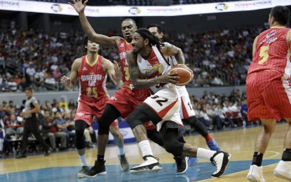 <p>San Miguel Beermen's Renaldo Balkman drives to the basket during the PBA Commissioner's Cup match against Barangay Ginebra at the Mall of Asia Arena in Pasay City on Sunday night, June 3, 2018. <em>(Photo courtesy of PBA Media Bureau)</em></p>